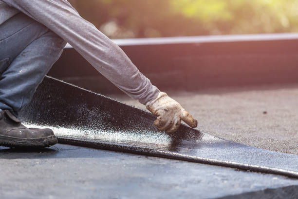 Professional Waterproofing technician working in Caledonia, WI